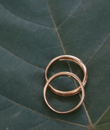 wedding rings on a leaf