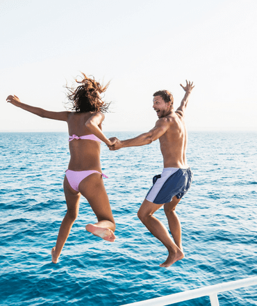 people jumping off the boat