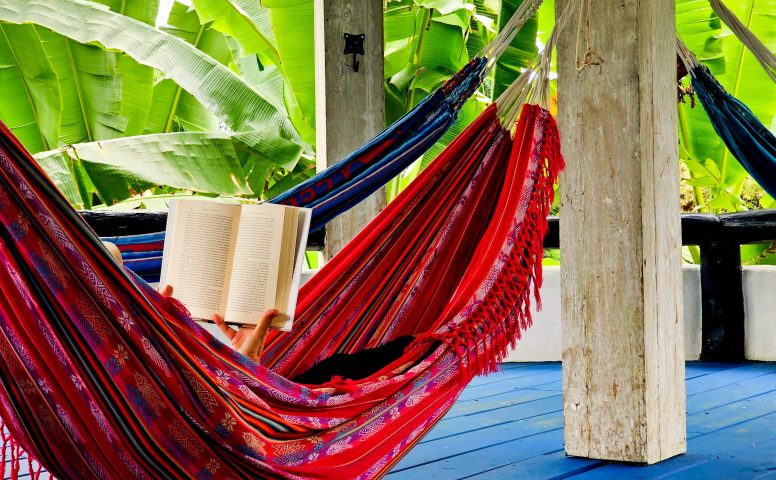 Reading in hammock lounge